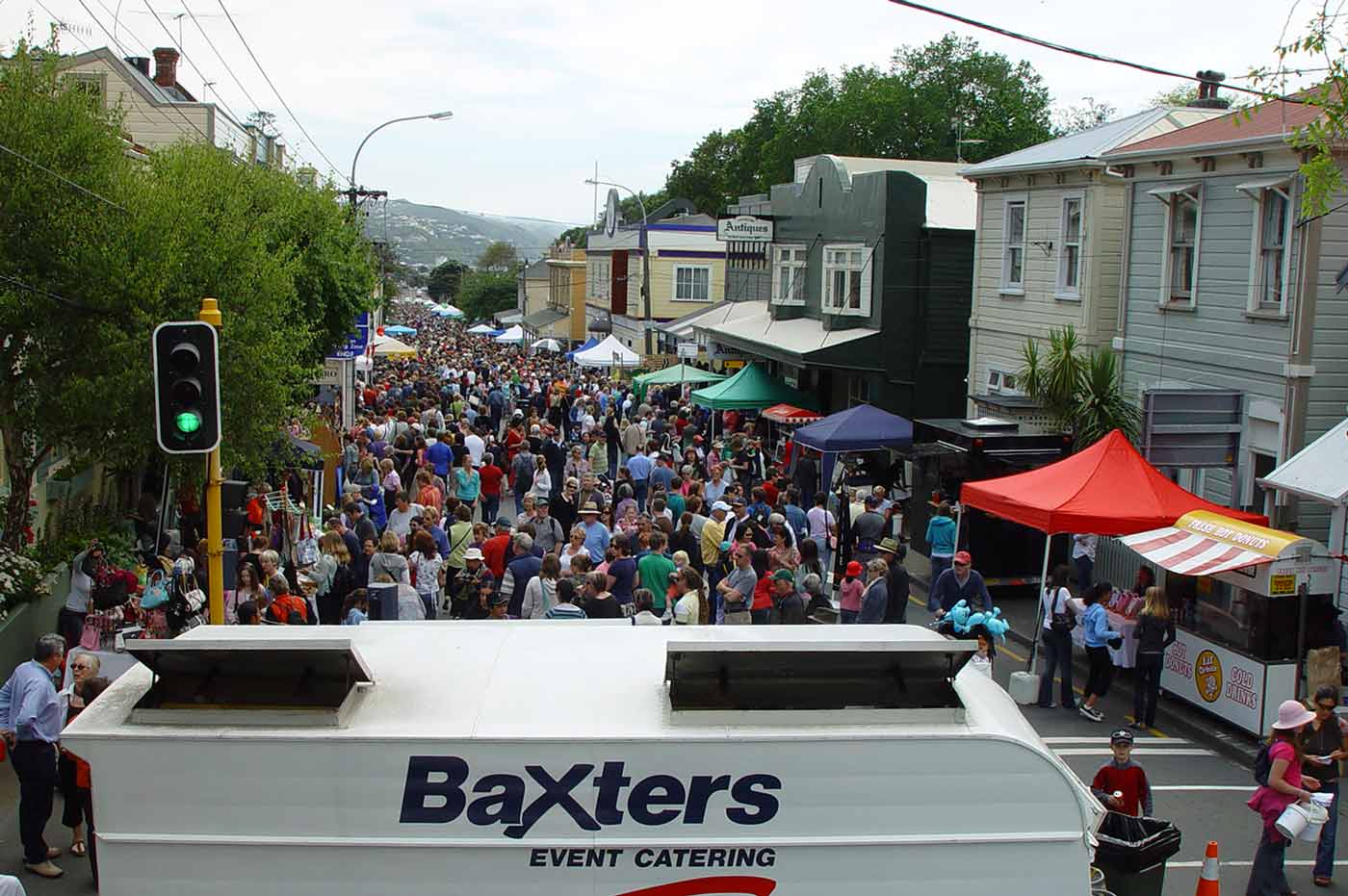 Food Caravan behind large crowd
